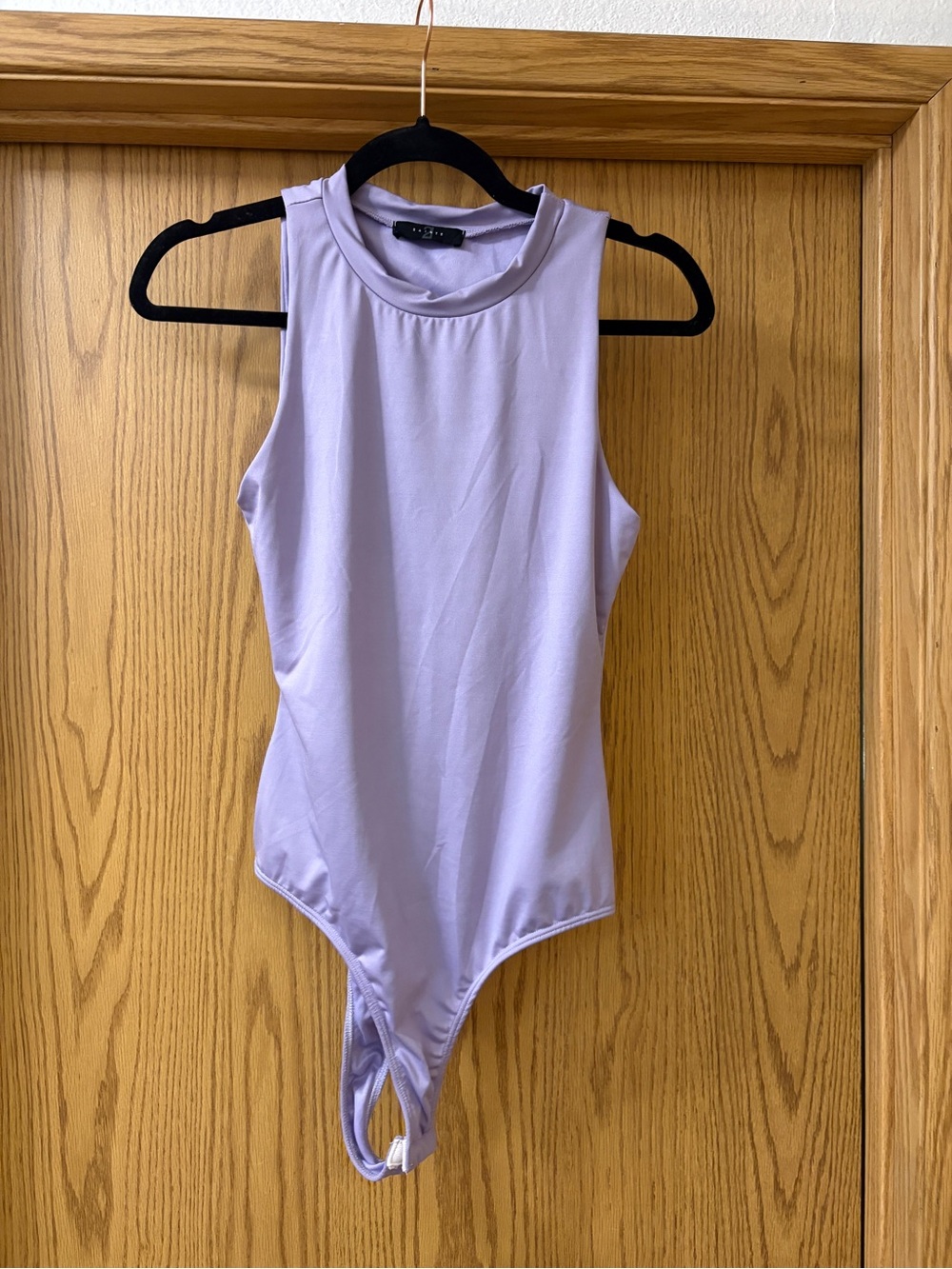 Sleeveless Lavender High-Neck Bodysuit